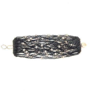 Brazalete cosecha 25 hilos plata.